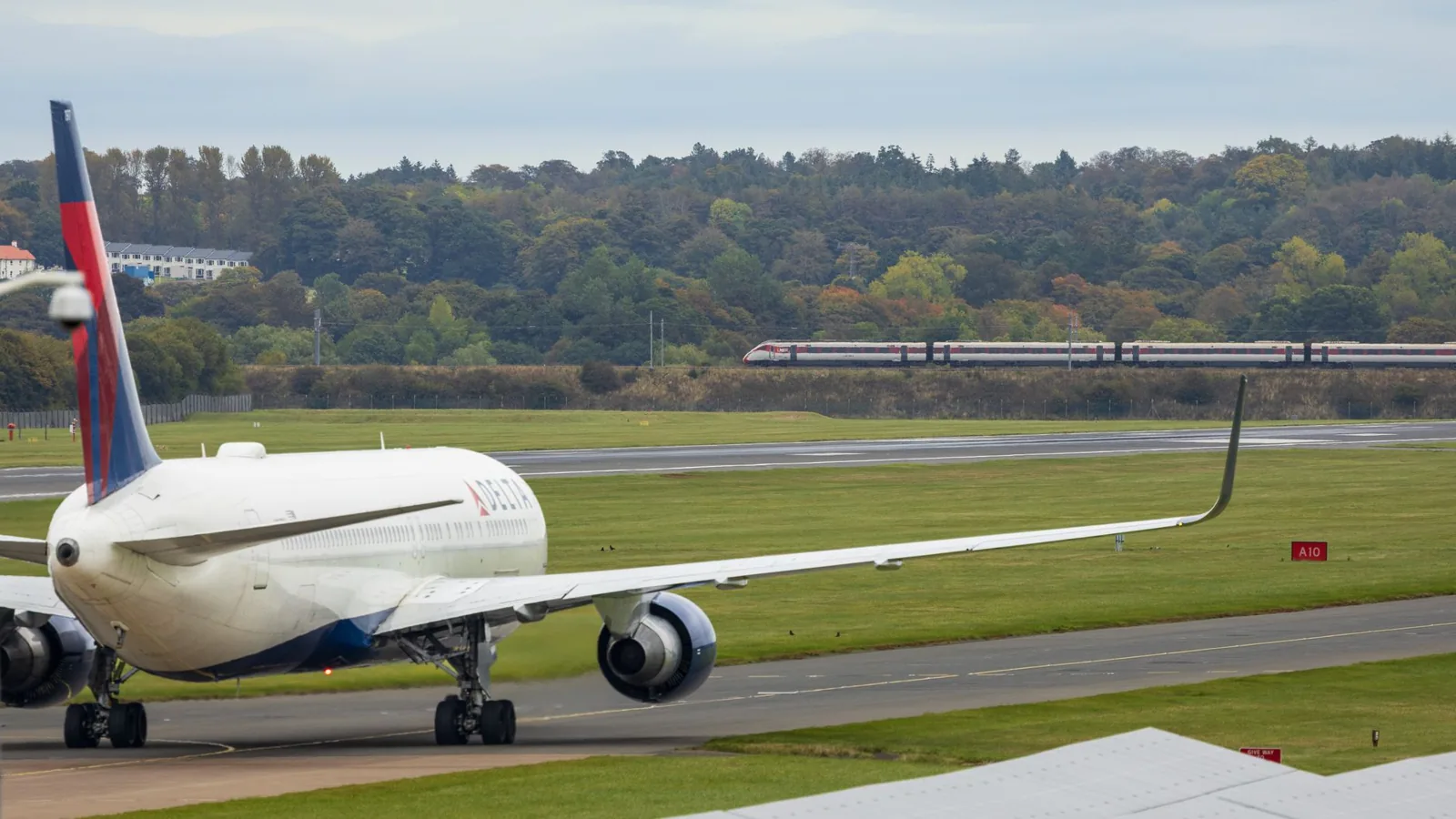 train vs plane cost compared between Amtrak and a domestic flight